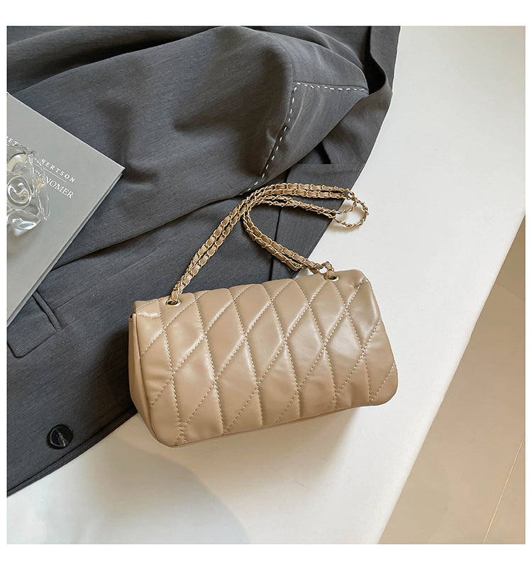 # Quilted Striped Chain Crossbody Bag