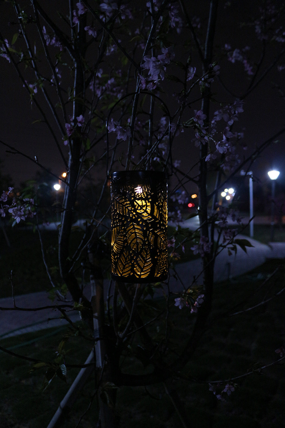 Solar-Powered Wrought Iron Hollow Projector Light