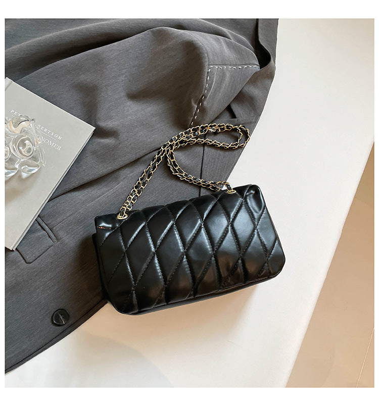 # Quilted Striped Chain Crossbody Bag